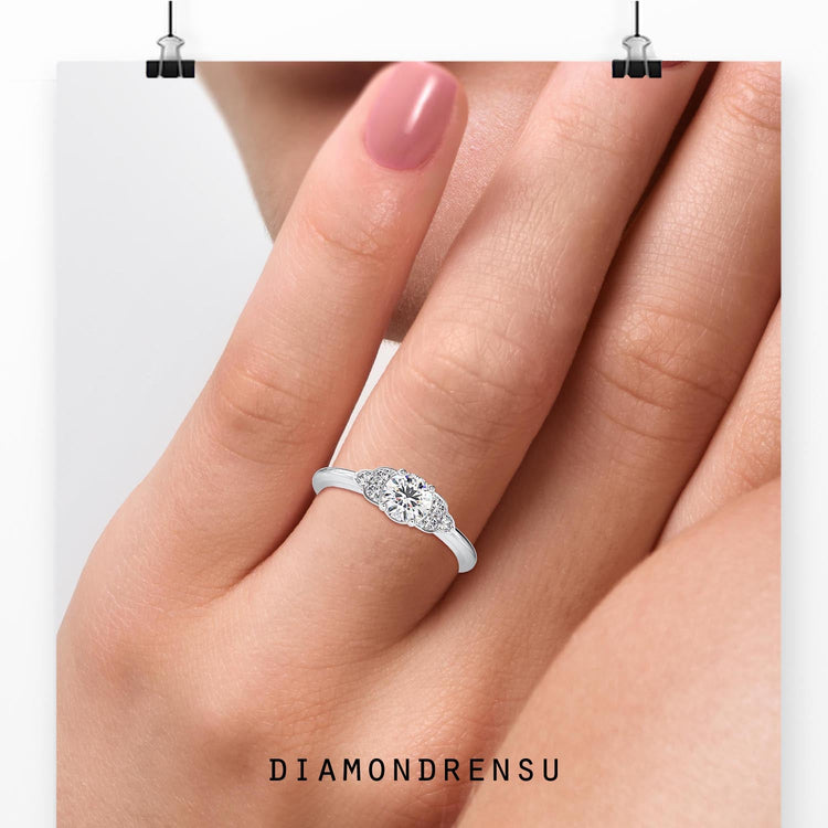 Round diamond engagement ring with four prong setting.
