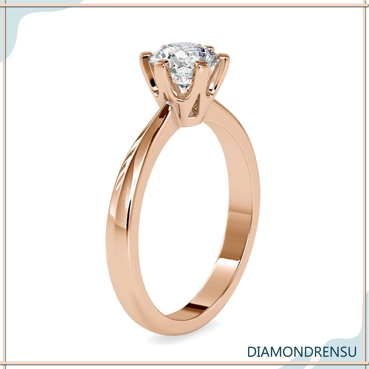 IGI certified engagement ring in six prong solitaire style.
