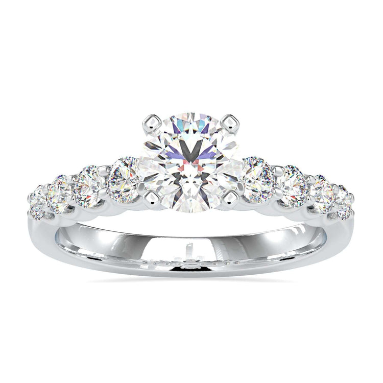 Round brilliant cut lab grown diamond engagement ring in 4 prong setting.
