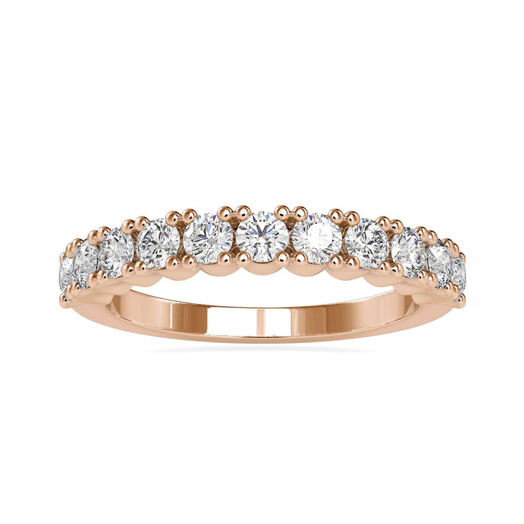 Custom UK gold band featuring round cut lab diamonds.
