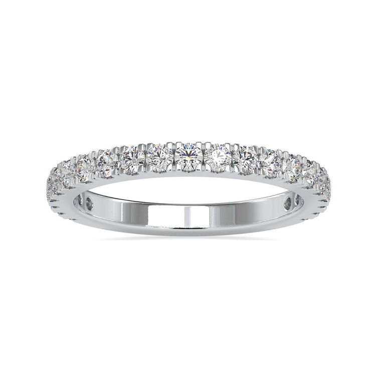 Custom gold band featuring handmade round diamond setting.
