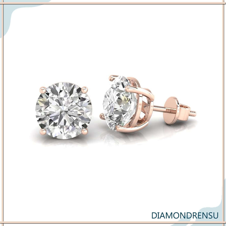 Diamond stud earrings in handmade gold setting.
