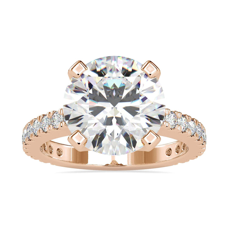 Tab prong setting ring in yellow gold style.
