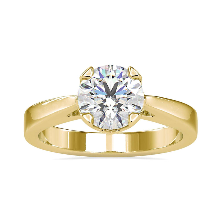 Simple diamond ring with round cut in tapered shank design.
