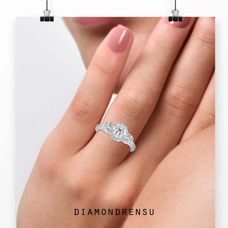 Tulip ring featuring round diamond side stones in rose gold.
