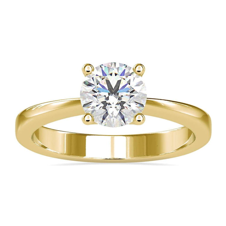 Diamond solitaire engagement ring with round cut, handmade in the UK.
