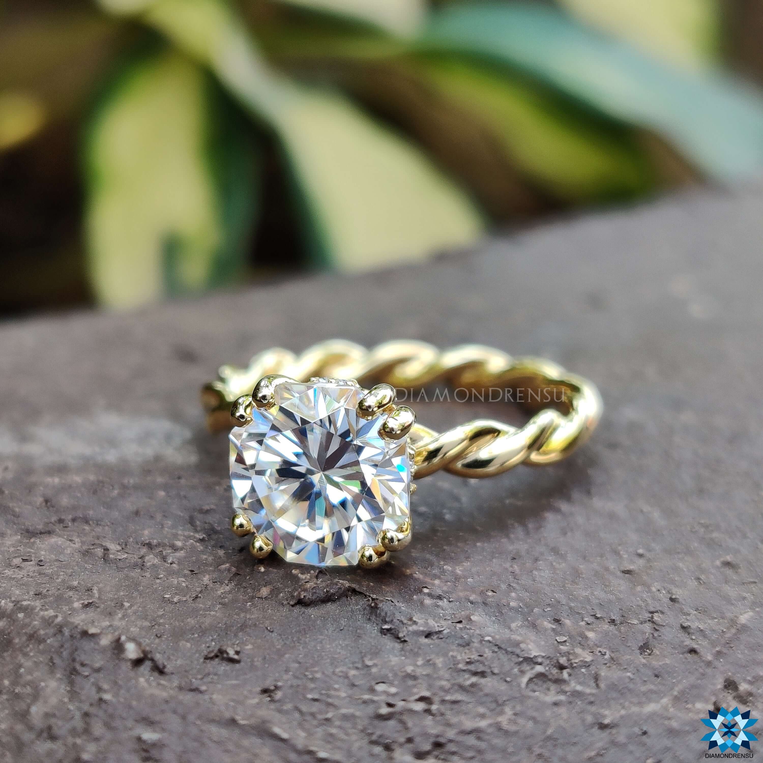 Engagement ring with hidden halo design, emphasizing elegance and discreet luxury in its craftsmanship.
