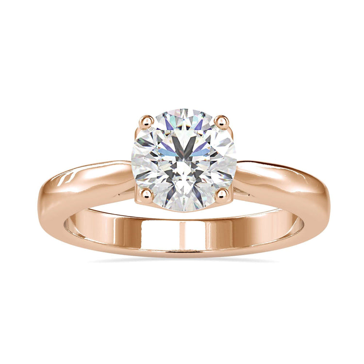 Hidden heart engagement ring with round diamond, handmade in the UK.
