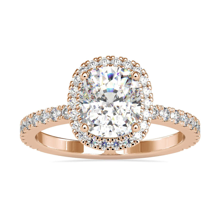 Hidden halo engagement ring with round cut accents.
