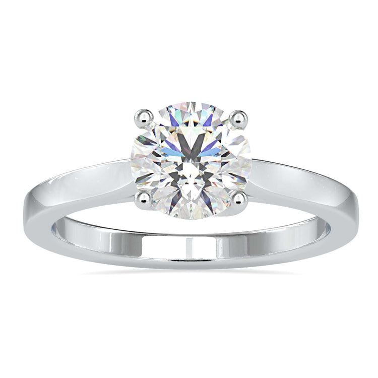 Solitaire round diamond ring with 4 prong setting, handmade in UK.
