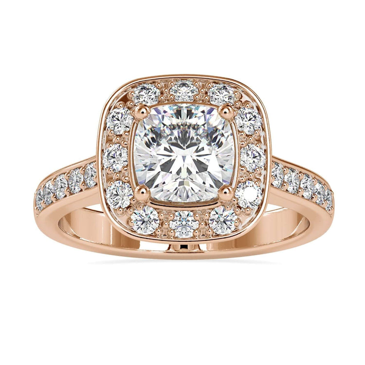 Cushion halo engagement ring with lab grown centre diamond in rose gold.
