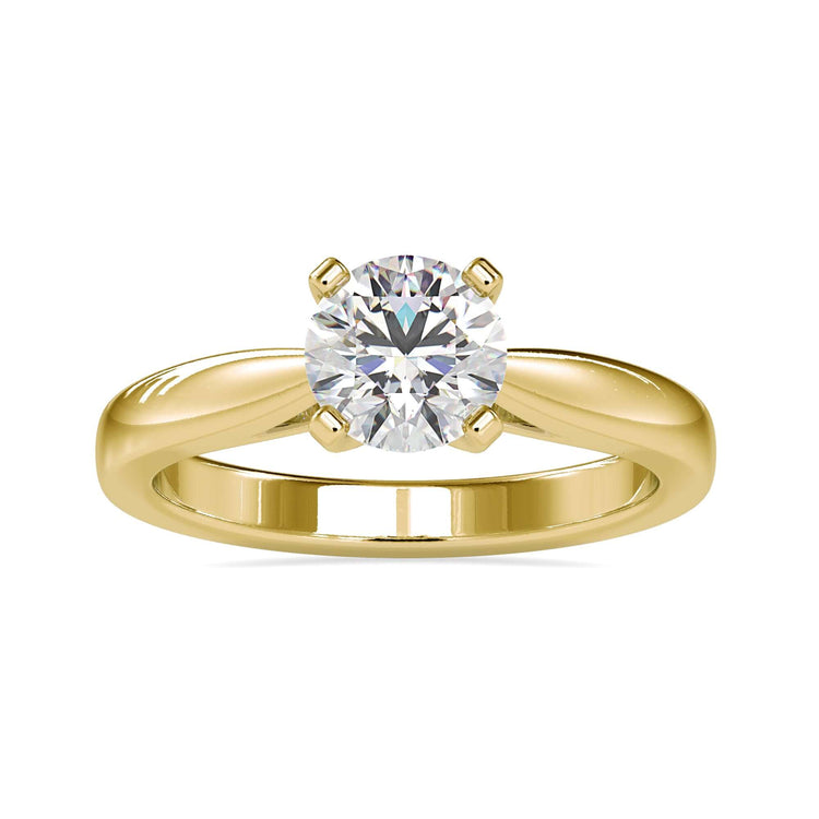 UK engagement ring featuring tab prong round cut setting.
