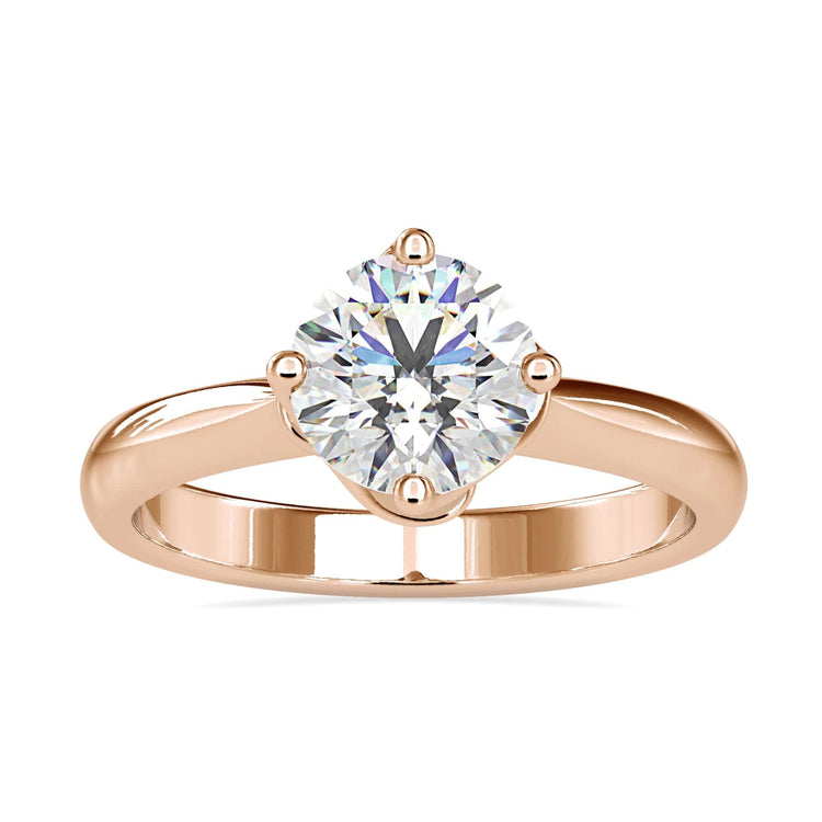 Solitaire diamond engagement ring with round cut centre.

