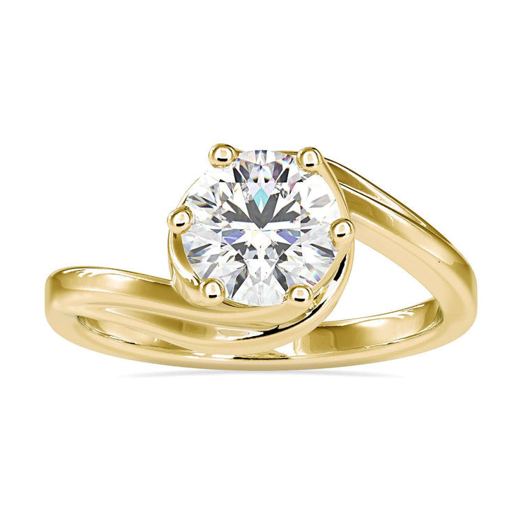 Solitaire engagement ring with round diamond and bypass setting.
