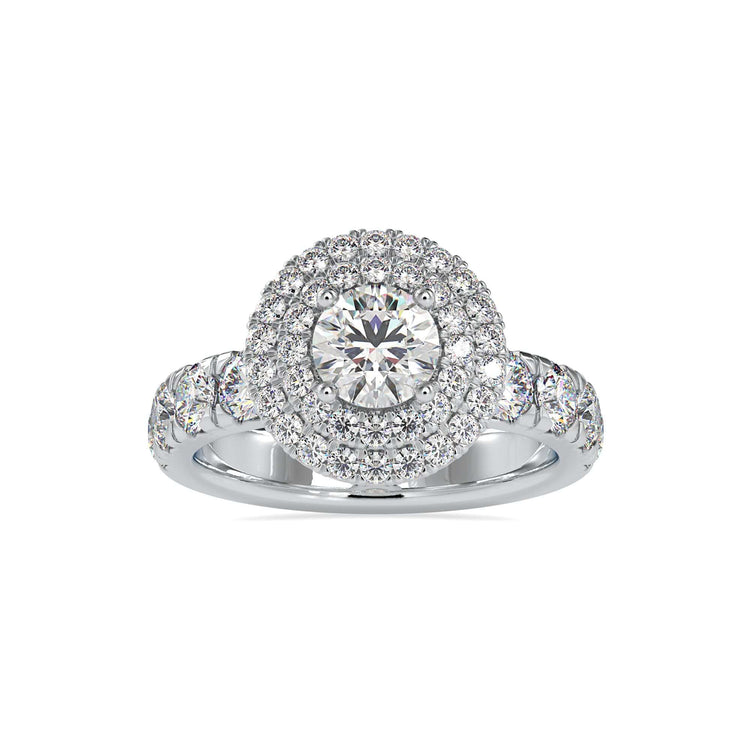 White gold halo ring with round cut diamond and hidden peekaboo design.
