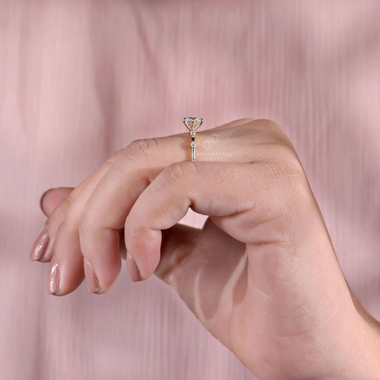 Handmade claw prong ring with igi certified diamond quality.