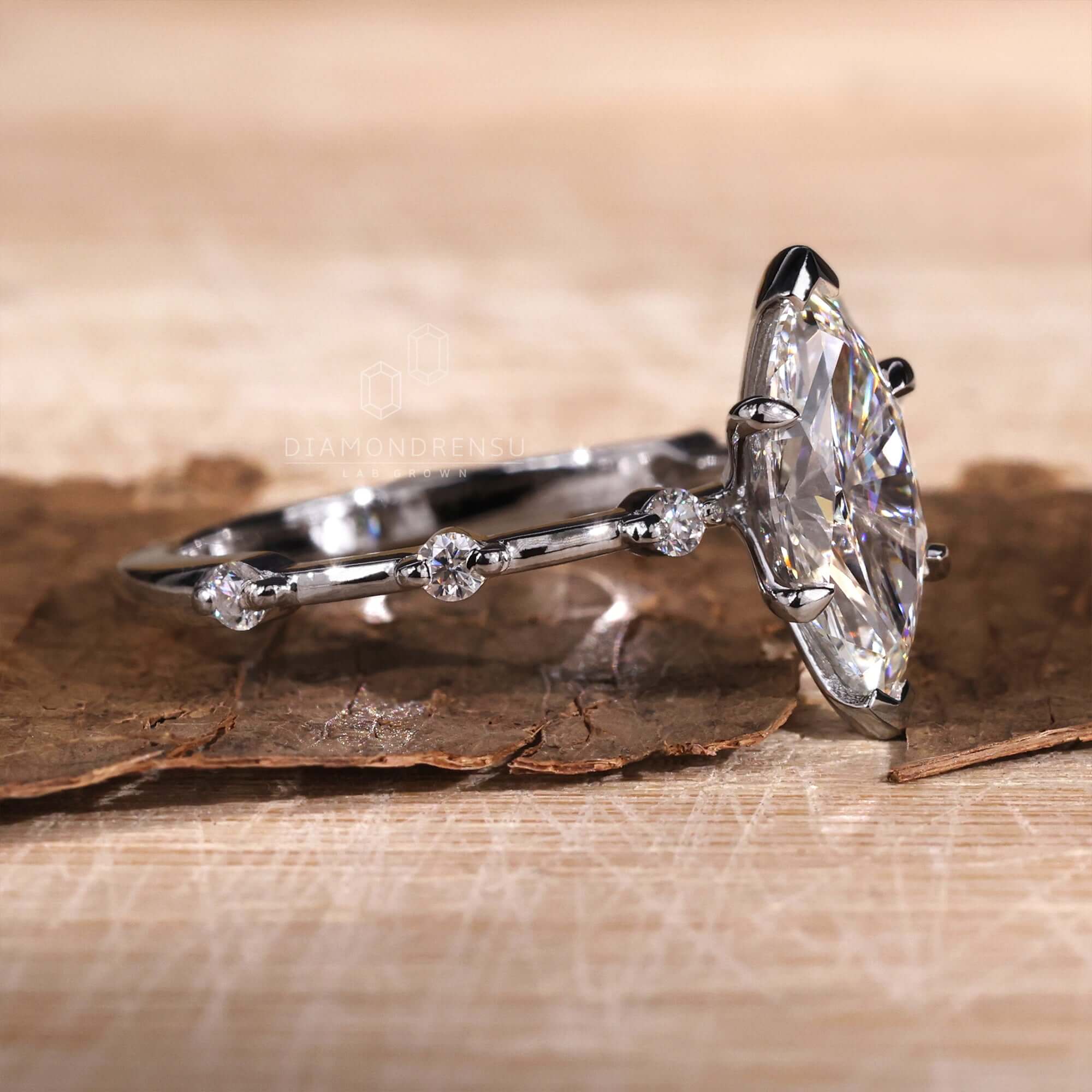 Marquise pave diamond ring with a luxurious 4 prong claw setting.