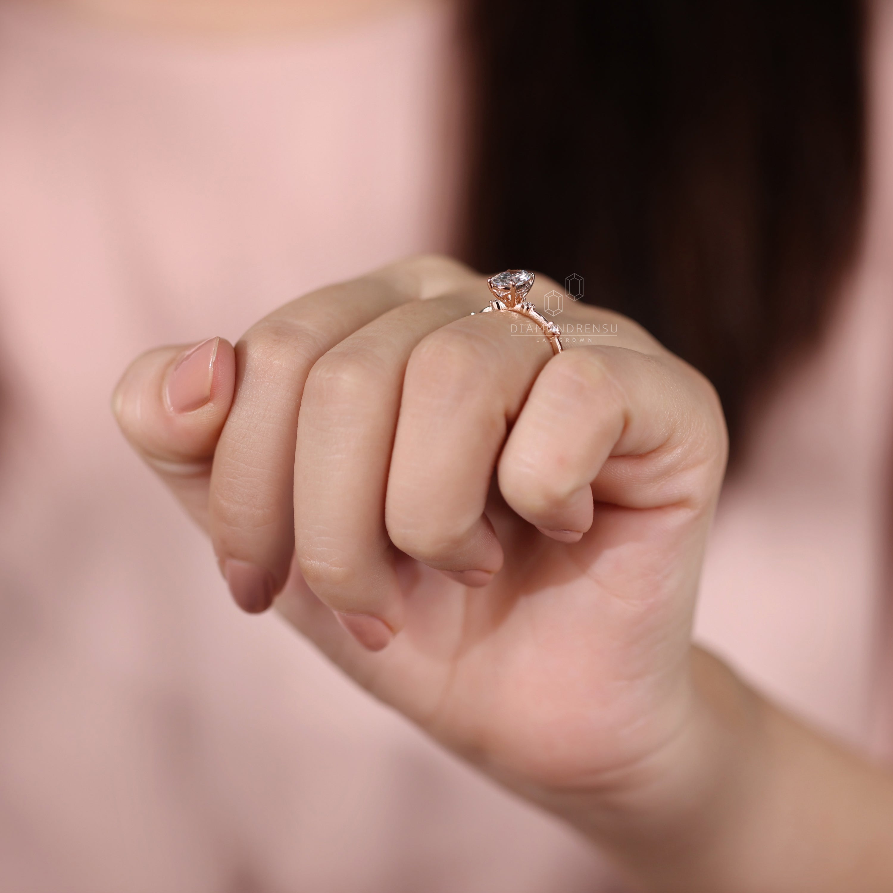 Oval cut diamond ring designed with claw prong detail.