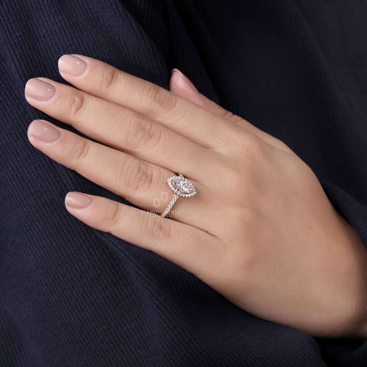 Pave diamond ring paired with a cathedral ring setting style
