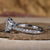 Teardrop ring designed with a unique 4 prong diamond setting
