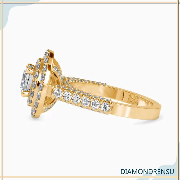 Round cut diamond ring with double halo and bridge accent.
