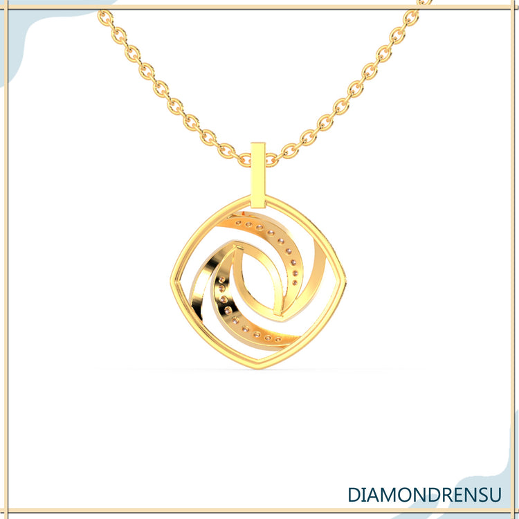 Lab grown diamond pendant in elegant spiral gold setting.
