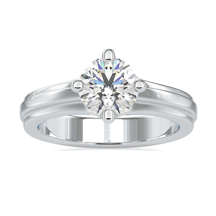 Lab grown diamond solitaire ring with compass prong setting in yellow gold.
