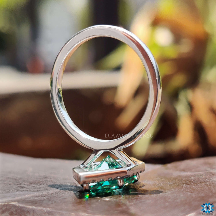 Halo ring with marquise moissanite.