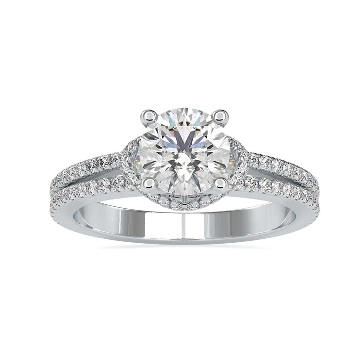 Simple diamond ring with round cut and pave accents.
