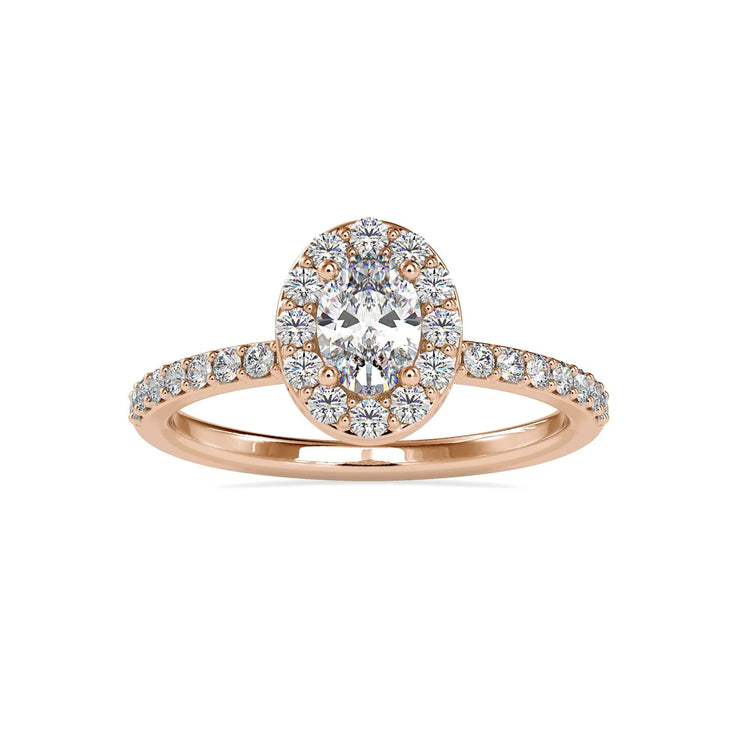 Round diamond halo setting with lab grown oval centre.
