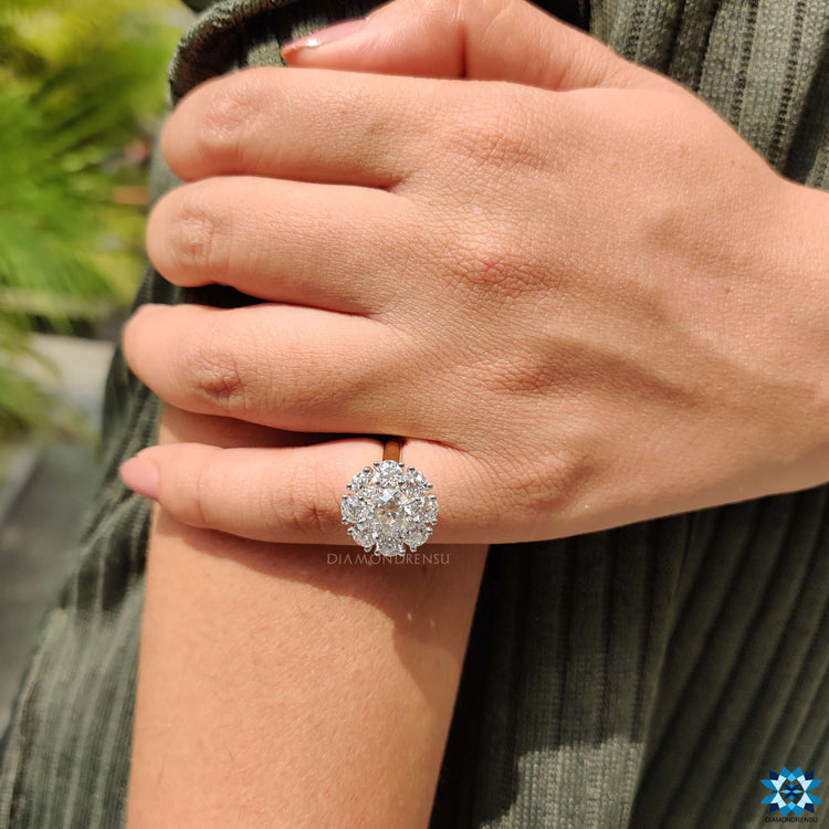 White and yellow gold engagement ring with elegant prong setting.
