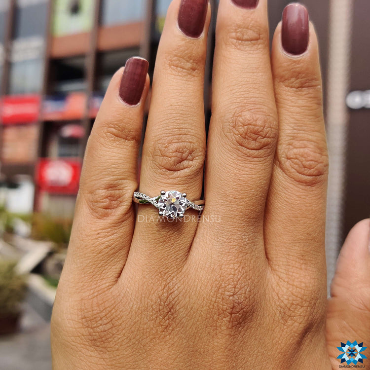 Buy custom moissanite engagement ring with pave infinity band.
