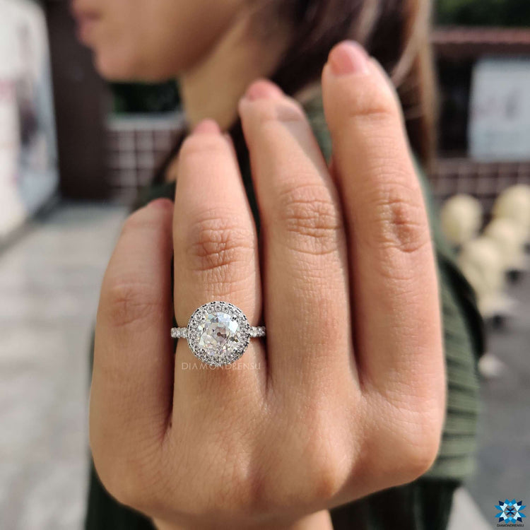 Handmade halo ring with old European cut moissanite.
