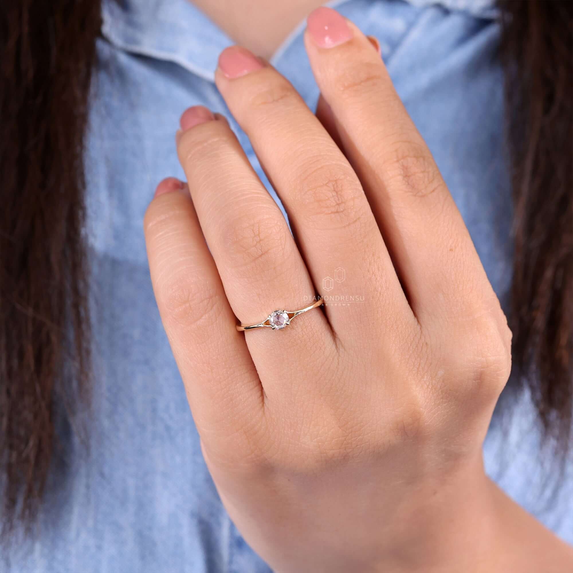 Yellow gold engagement ring with a rose cut diamond design
