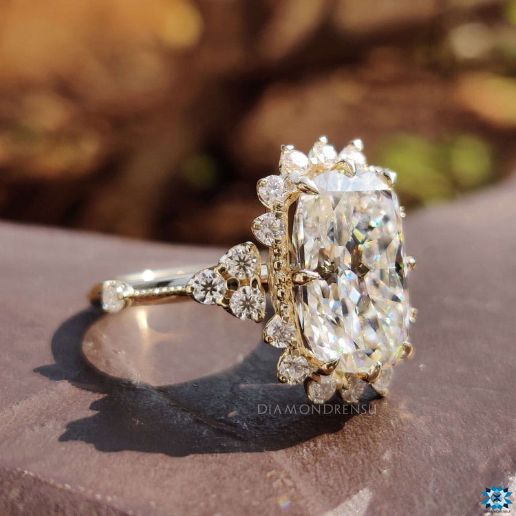Custom moissanite ring with milgrain detailing.

