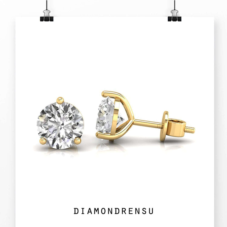 Handmade jewellery with round diamond stud earrings.

