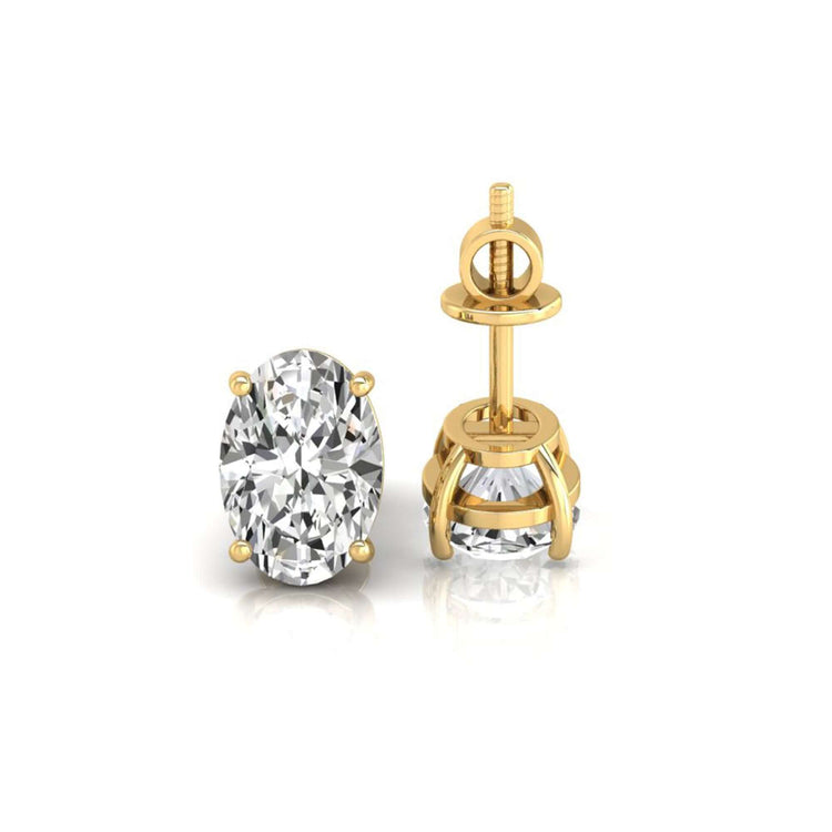 Classic gold diamond stud earrings with basket setting by Diamondrensu UK.
