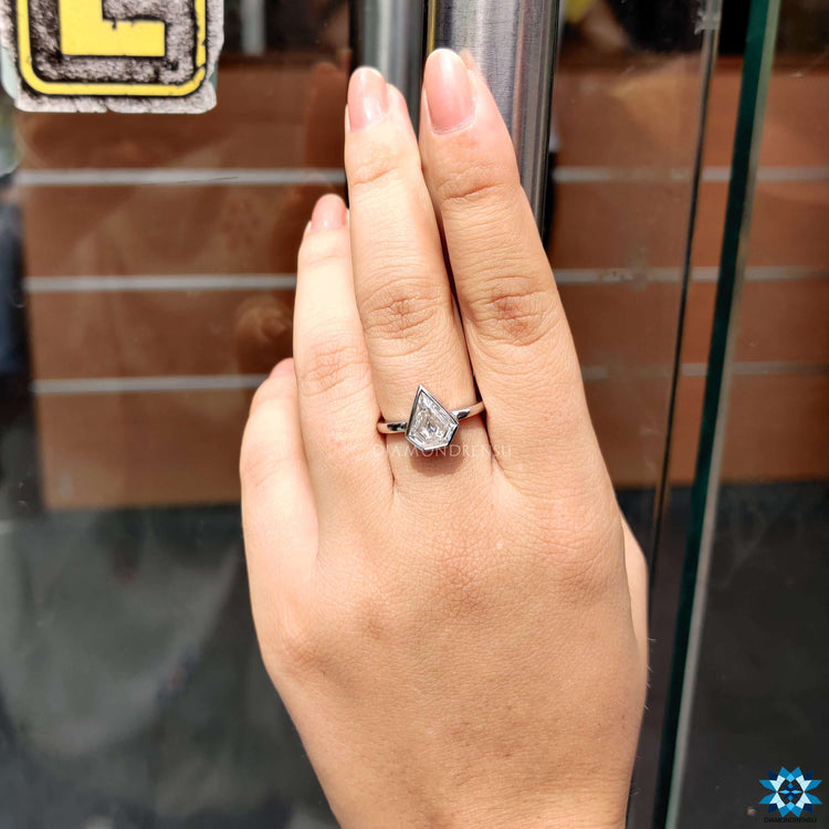 Diamondrensu UK shield cut engagement ring.
