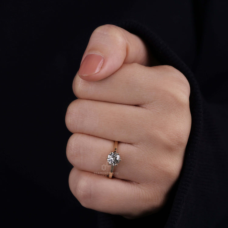 Diamondrensu UK engagement ring with a cathedral setting and Jubilee cut 
diamond
