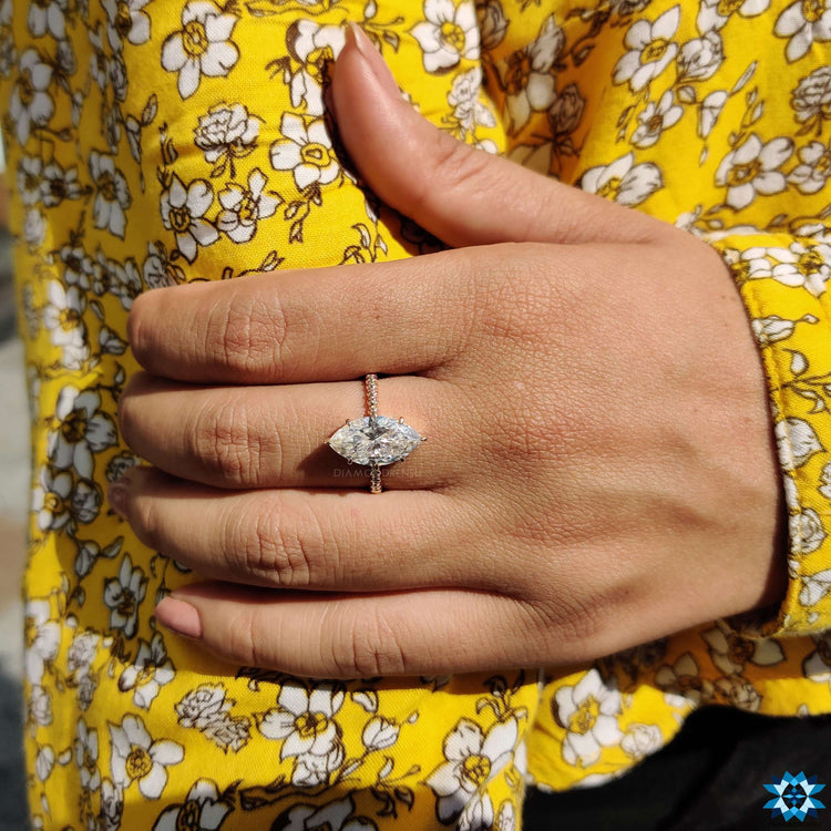 Handmade marquise cut moissanite solitaire ring.
