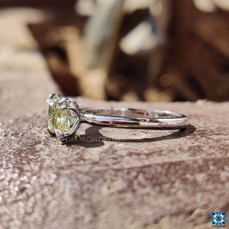 White gold engagement ring with double claw prong.
