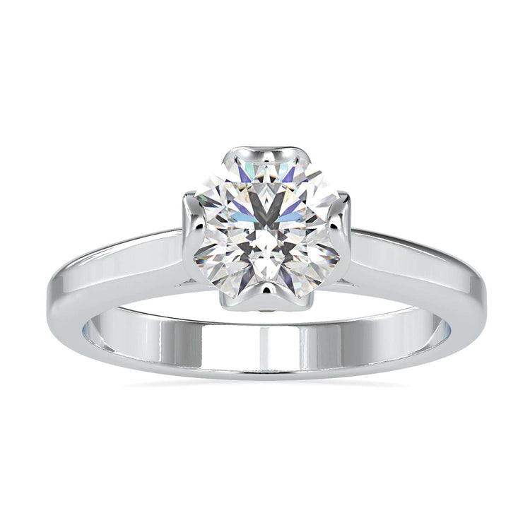 Round Solitaire Engagement Ring in yellow gold with hidden accent detail.
