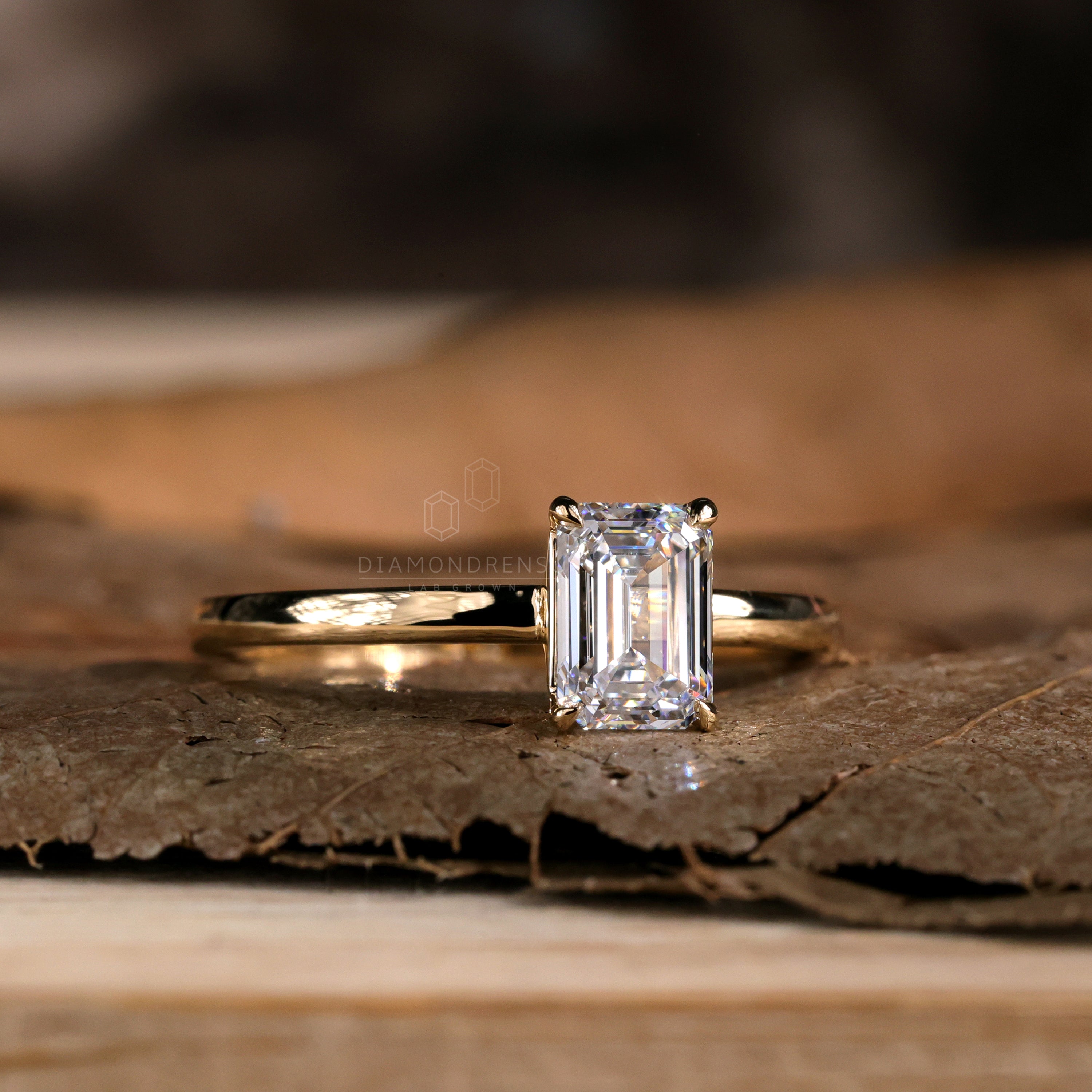 Engagement ring emerald cut style with dazzling details.