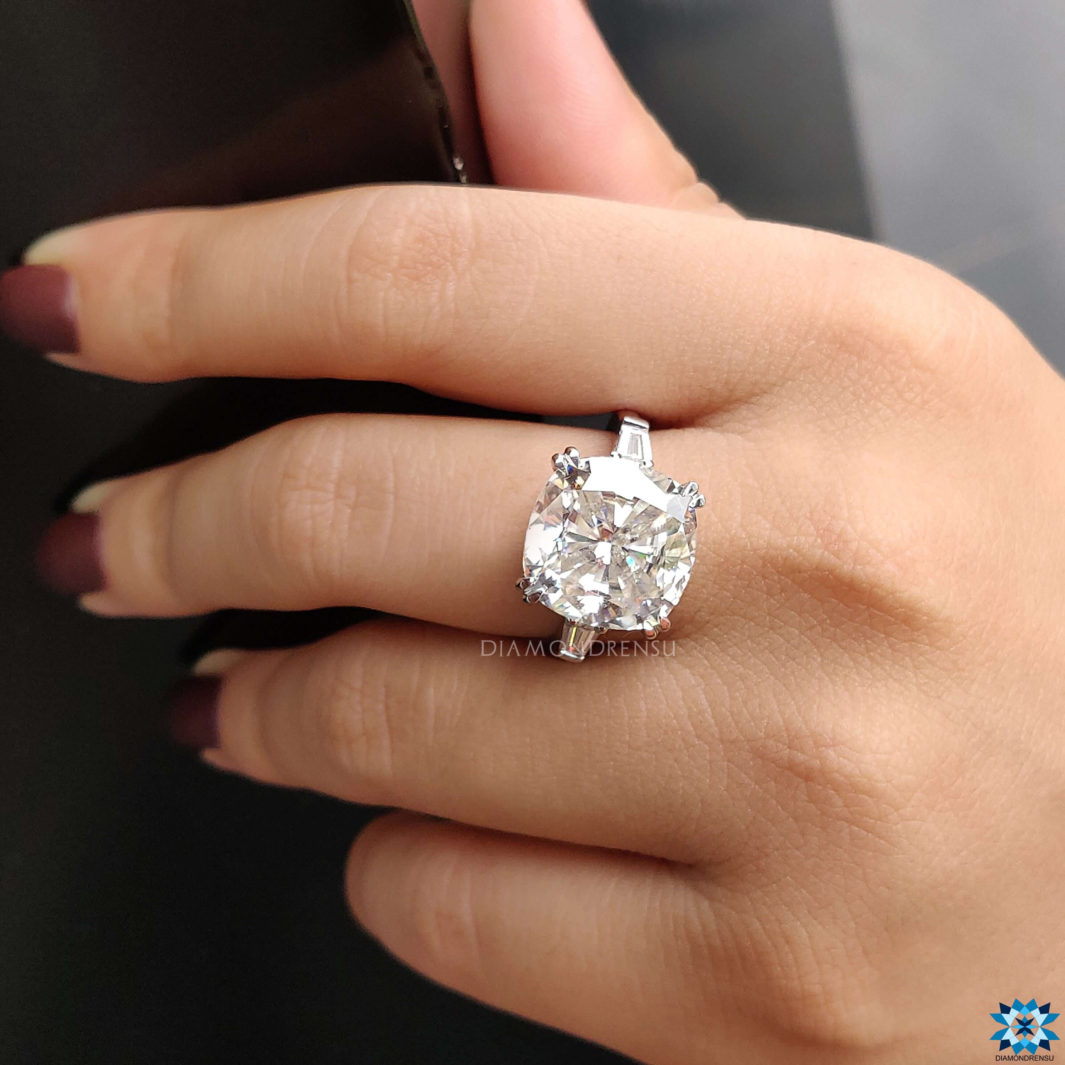 3 stone moissanite ring featuring a beautiful cushion cut moissanite ring.