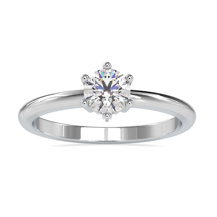 Six prong engagement ring featuring round lab grown diamond in white gold.
