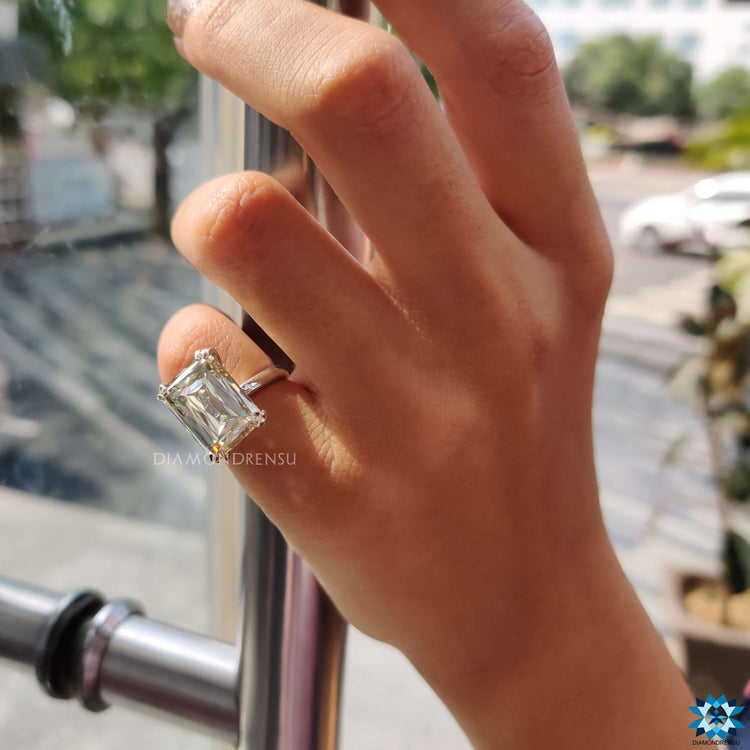 White gold solitaire engagement ring with criss cut stone.
