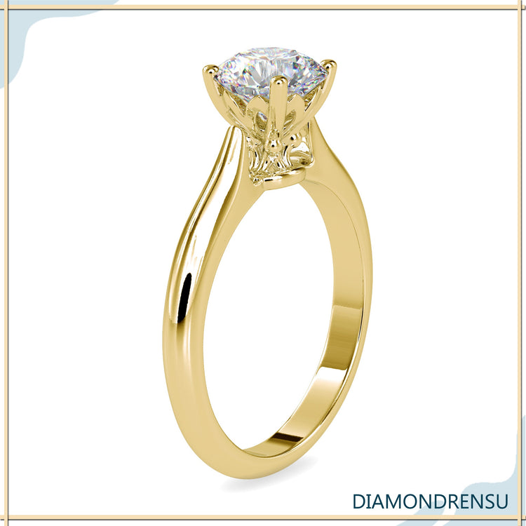 Designer ring with round cut lab grown diamond and knife edge band.
