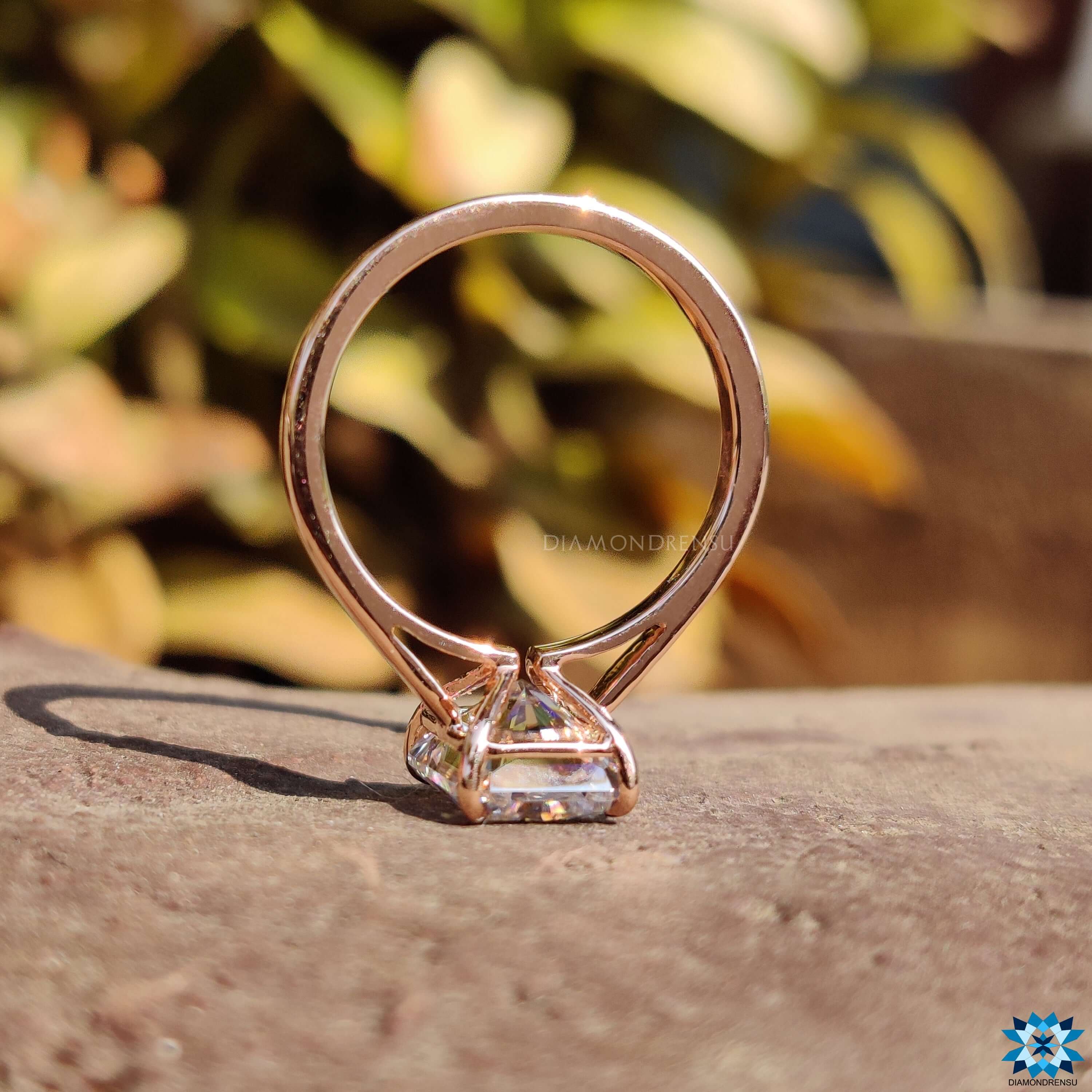 Radiant cut engagement ring featuring a solitaire setting, capturing a classic and elegant look.
