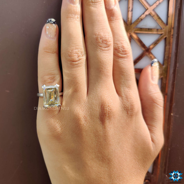 Handmade jewelry featuring light yellow moissanite.

