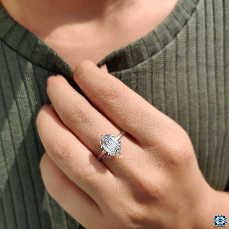 Cushion criss cut moissanite set in a solitaire design.
